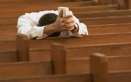 man-praying-in-church.jpg